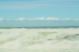 Foamy Waves And Puffy Clouds