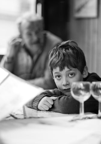 Boy In Paris Restaurant (9069642)