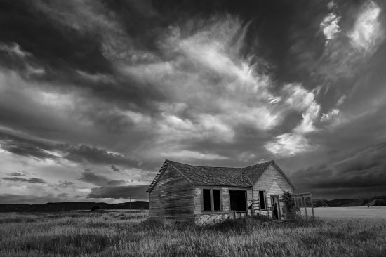Abandoned Farmhouse On Prairie