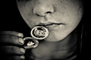 Girl With Locket.
