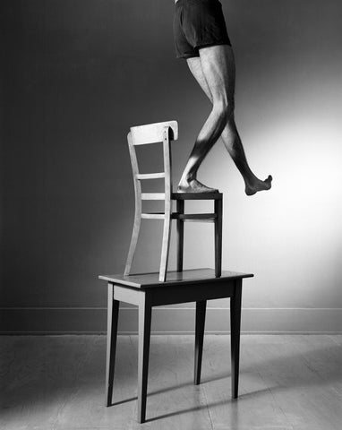 Man, Chair And Table